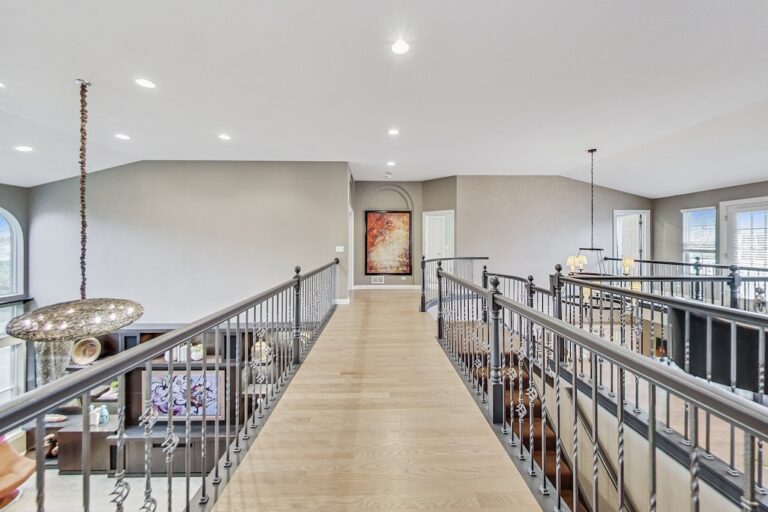 beautiful railing upstairs hallway